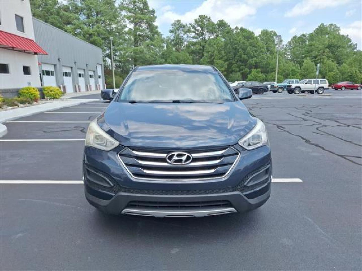 2016 Blue Hyundai Santa Fe Sport 2.4 AWD (5XYZTDLB9GG) , 6-Speed Automatic transmission, located at 3900 Bragg Blvd., Fayetteville, NC, 28303, (910) 868-3000, 35.081905, -78.943367 - Photo#2