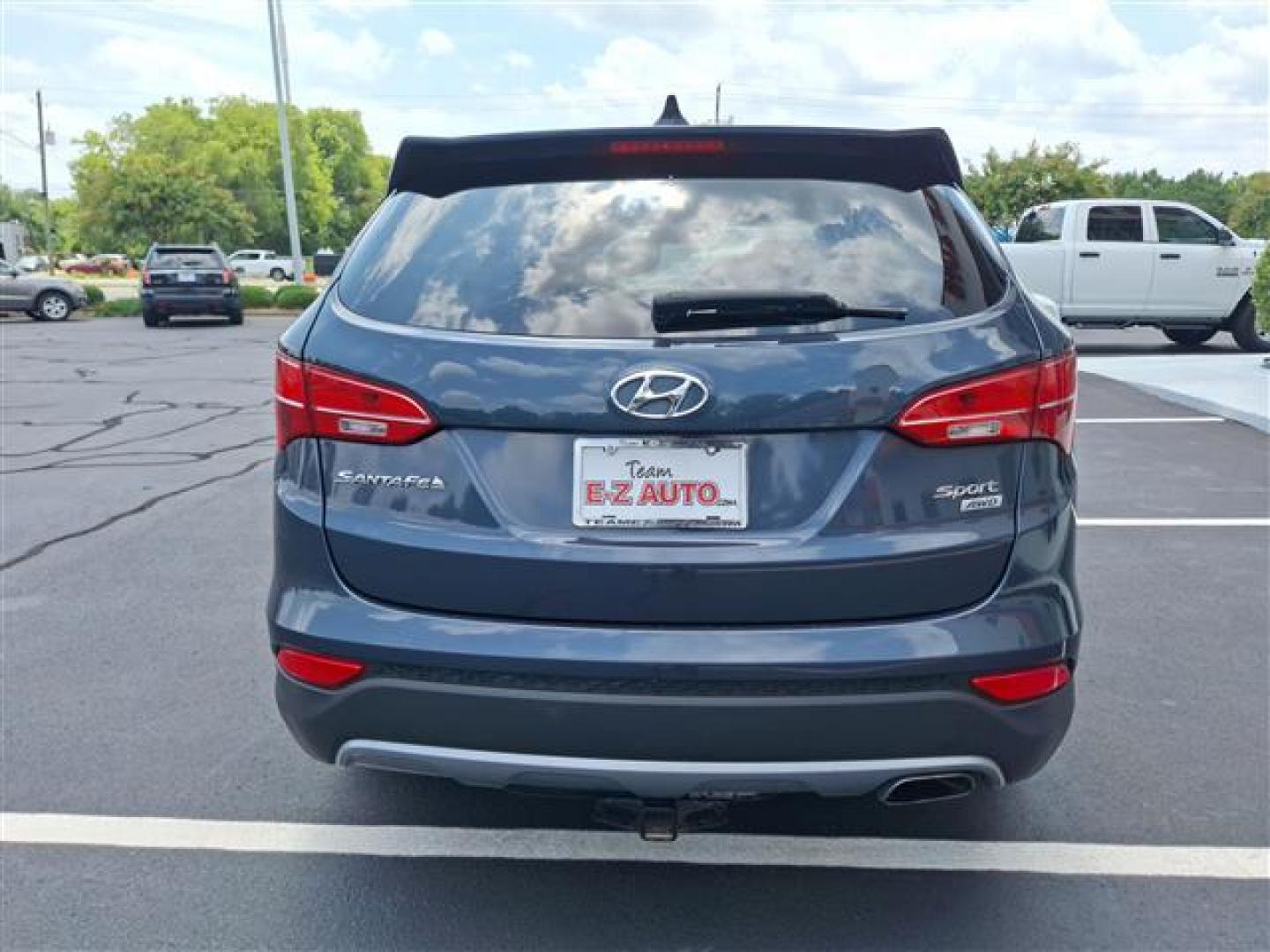 2016 Blue Hyundai Santa Fe Sport 2.4 AWD (5XYZTDLB9GG) , 6-Speed Automatic transmission, located at 3900 Bragg Blvd., Fayetteville, NC, 28303, (910) 868-3000, 35.081905, -78.943367 - Photo#3