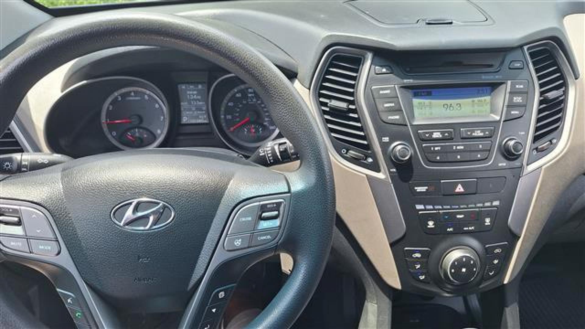 2016 Blue Hyundai Santa Fe Sport 2.4 AWD (5XYZTDLB9GG) , 6-Speed Automatic transmission, located at 3900 Bragg Blvd., Fayetteville, NC, 28303, (910) 868-3000, 35.081905, -78.943367 - Photo#8