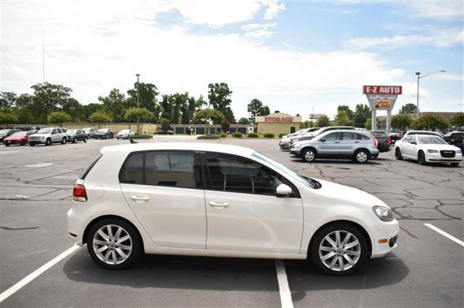 2011 Candy White Volkswagen Golf 2.0L 4-Door TDI (WVWDM7AJ0BW) , 6-Speed Automatic transmission, located at 3900 Bragg Blvd., Fayetteville, NC, 28303, (910) 868-3000, 35.081905, -78.943367 - T-9653 - 2011 Volkswagen Golf WVWDM7AJ0BW339086 - Photo#1