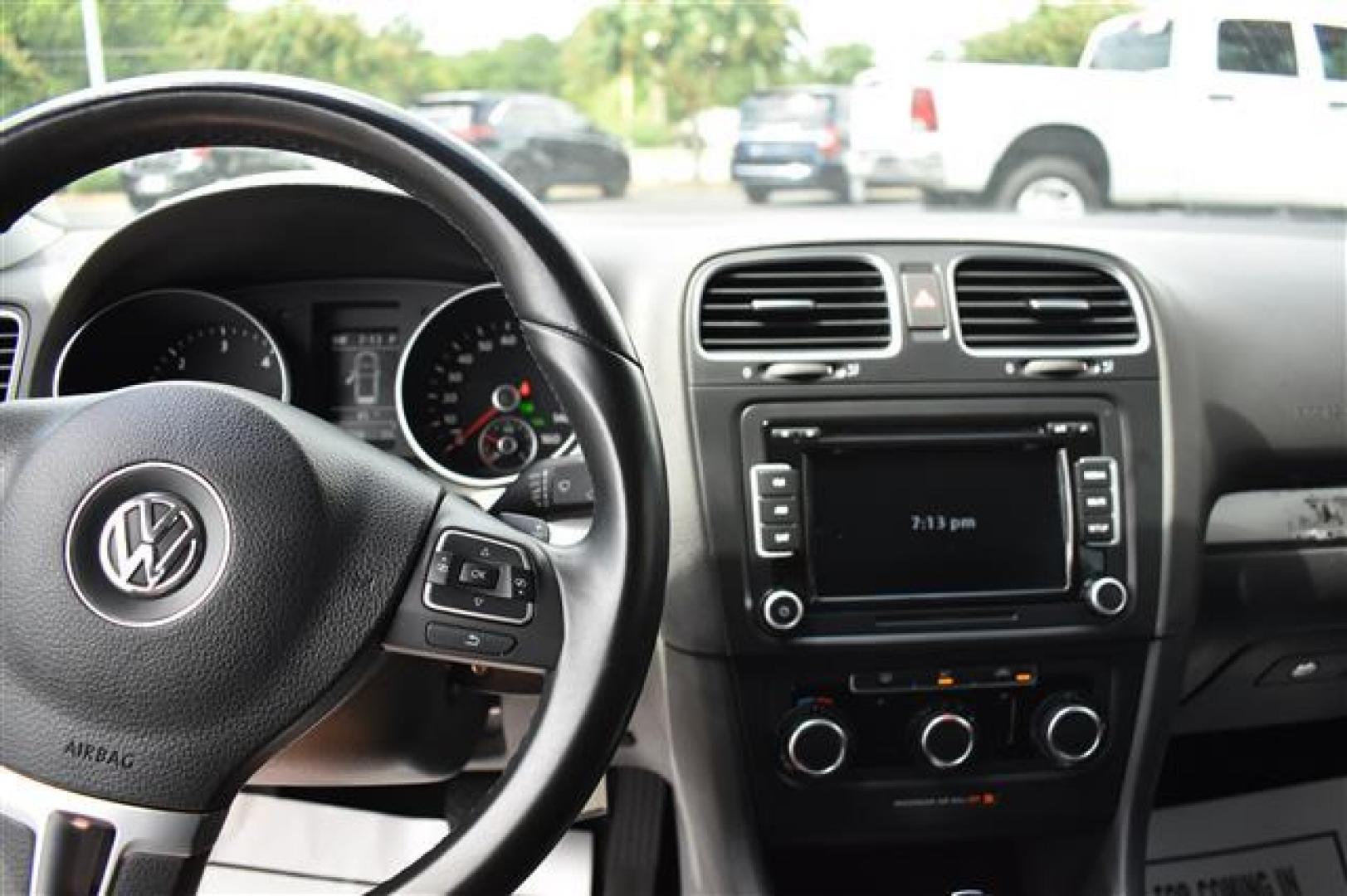 2011 Candy White Volkswagen Golf 2.0L 4-Door TDI (WVWDM7AJ0BW) , 6-Speed Automatic transmission, located at 3900 Bragg Blvd., Fayetteville, NC, 28303, (910) 868-3000, 35.081905, -78.943367 - T-9653 - 2011 Volkswagen Golf WVWDM7AJ0BW339086 - Photo#6