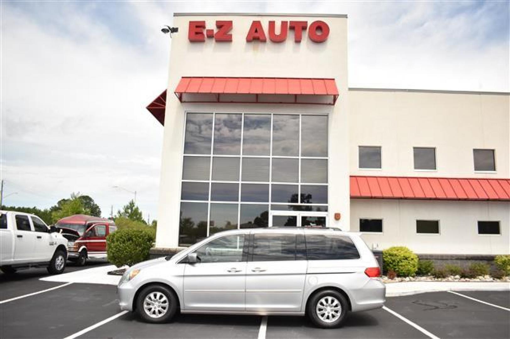 2010 Silver /Gray Honda Odyssey EX (5FNRL3H41AB) , 5-Speed Automatic transmission, located at 3900 Bragg Blvd., Fayetteville, NC, 28303, (910) 868-3000, 35.081905, -78.943367 - T-9656 - 2010 Honda Odyssey 5FNRL3H41AB075848 - Photo#0