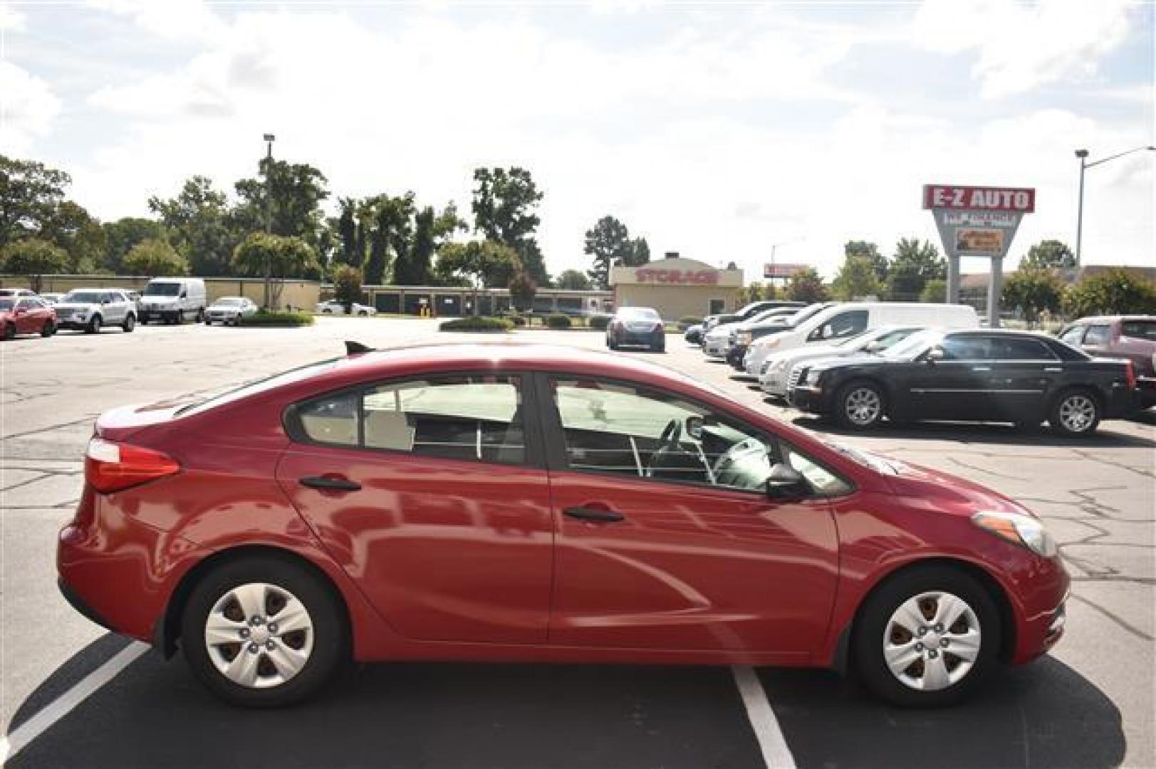 2016 Red Kia Forte LX (KNAFX4A6XG5) , 6-Speed Automatic transmission, located at 3900 Bragg Blvd., Fayetteville, NC, 28303, (910) 868-3000, 35.081905, -78.943367 - T-9657 - 2016 Kia Forte KNAFX4A6XG5518482 - Photo#1