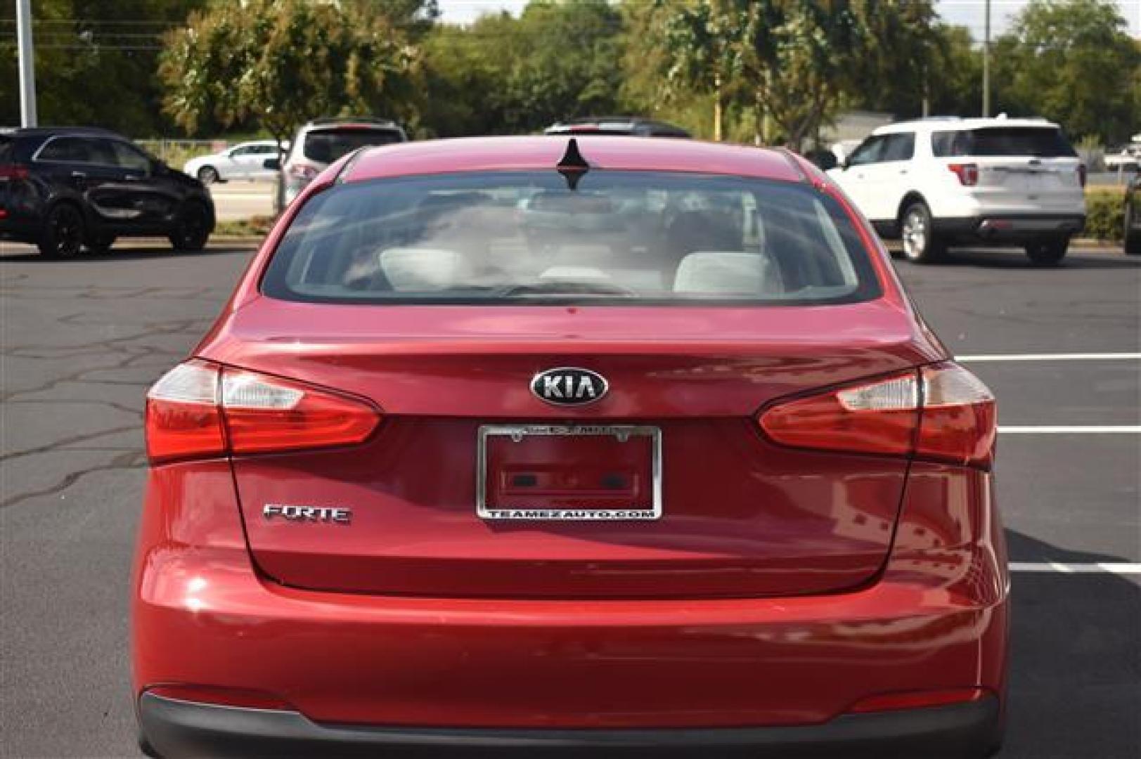 2016 Red Kia Forte LX (KNAFX4A6XG5) , 6-Speed Automatic transmission, located at 3900 Bragg Blvd., Fayetteville, NC, 28303, (910) 868-3000, 35.081905, -78.943367 - T-9657 - 2016 Kia Forte KNAFX4A6XG5518482 - Photo#3