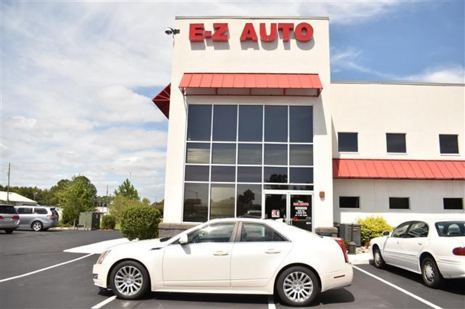 2012 Ivory Cadillac CTS Performance w/ Navi (1G6DK5E34C0) , 6-Speed Automatic transmission, located at 3900 Bragg Blvd., Fayetteville, NC, 28303, (910) 868-3000, 35.081905, -78.943367 - T-9677 - 2012 Cadillac CTS 1G6DK5E34C0123402 - Photo#0