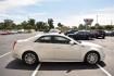 2012 Ivory Cadillac CTS Performance w/ Navi (1G6DK5E34C0) , 6-Speed Automatic transmission, located at 3900 Bragg Blvd., Fayetteville, NC, 28303, (910) 868-3000, 35.081905, -78.943367 - T-9677 - 2012 Cadillac CTS 1G6DK5E34C0123402 - Photo#1