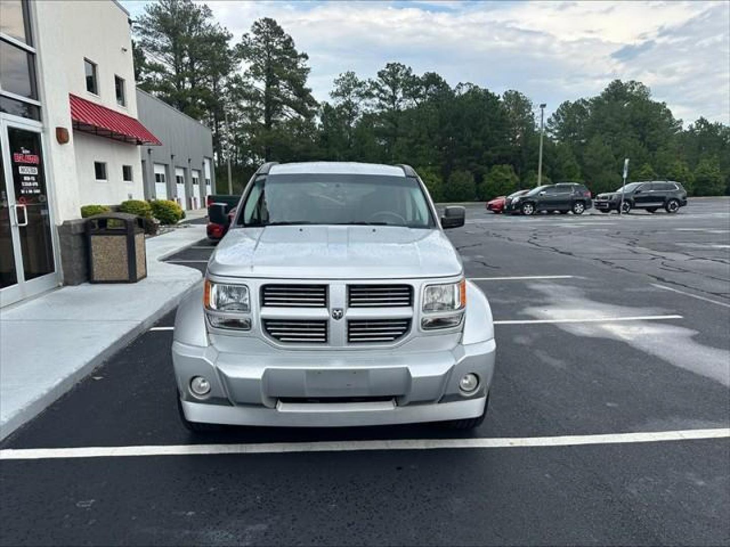 2010 Silver Dodge Nitro SXT 4WD (1D4PU5GX0AW) , 5-Speed Automatic transmission, located at 3900 Bragg Blvd., Fayetteville, NC, 28303, (910) 868-3000, 35.081905, -78.943367 - T-9690-R - 2010 Dodge Nitro 1D4PU5GX0AW108963- Photo#1