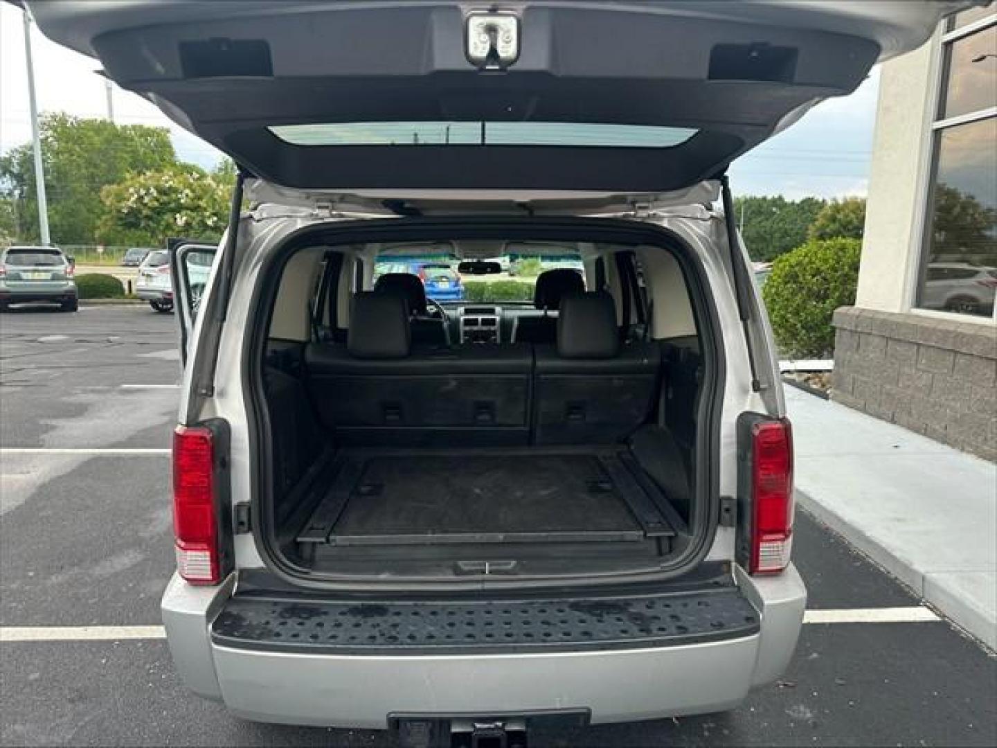 2010 Silver Dodge Nitro SXT 4WD (1D4PU5GX0AW) , 5-Speed Automatic transmission, located at 3900 Bragg Blvd., Fayetteville, NC, 28303, (910) 868-3000, 35.081905, -78.943367 - T-9690-R - 2010 Dodge Nitro 1D4PU5GX0AW108963- Photo#4