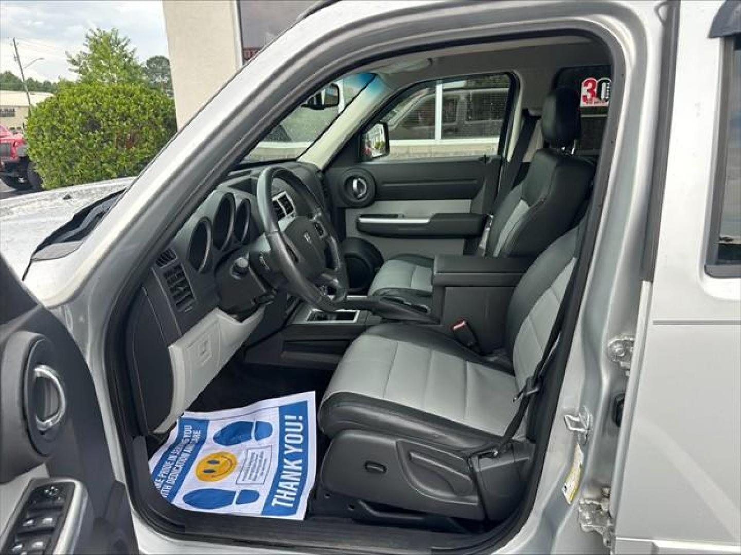 2010 Silver Dodge Nitro SXT 4WD (1D4PU5GX0AW) , 5-Speed Automatic transmission, located at 3900 Bragg Blvd., Fayetteville, NC, 28303, (910) 868-3000, 35.081905, -78.943367 - T-9690-R - 2010 Dodge Nitro 1D4PU5GX0AW108963- Photo#5