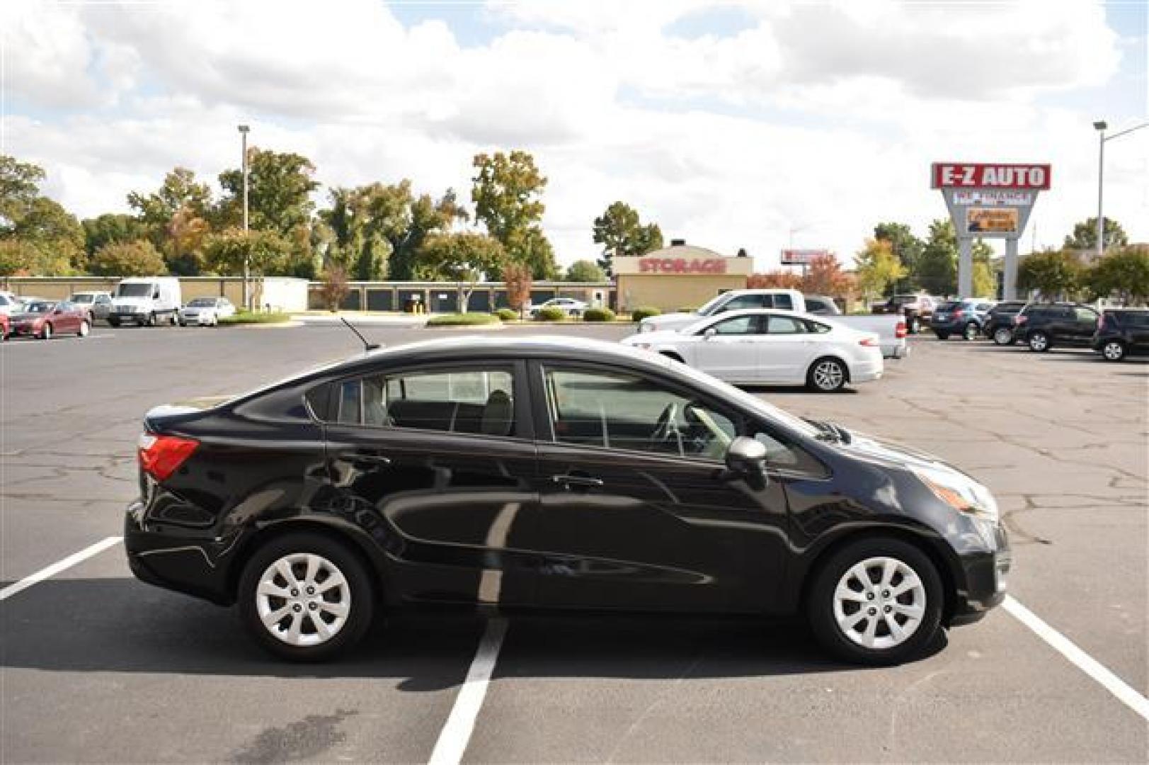 2015 Kia Rio LX (KNADM4A38F6) , 5-Speed Manual transmission, located at 3900 Bragg Blvd., Fayetteville, NC, 28303, (910) 868-3000, 35.081905, -78.943367 - T-9703 - 2015 Kia Rio KNADM4A38F6515028 - Photo#1