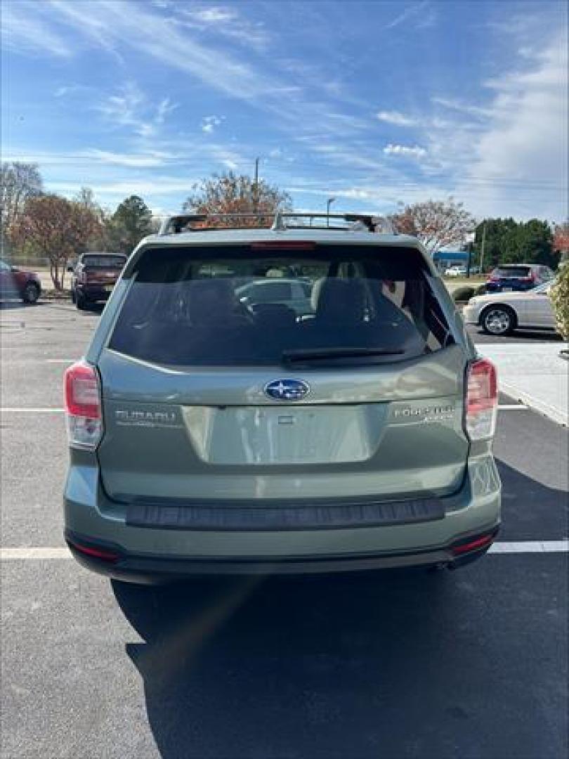 2017 Green Subaru Forester 2.5i Premium PZEV CVT (JF2SJAEC2HH) , Continuously Variable Transmission transmission, located at 3900 Bragg Blvd., Fayetteville, NC, 28303, (910) 868-3000, 35.081905, -78.943367 - T-9913 - 2017 Subaru Forester JF2SJAEC2HH575780 - Photo#2
