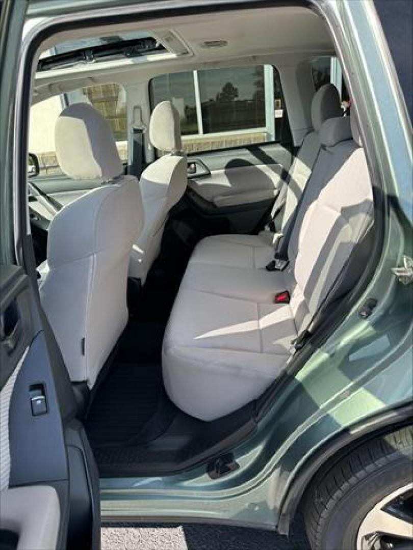 2017 Green Subaru Forester 2.5i Premium PZEV CVT (JF2SJAEC2HH) , Continuously Variable Transmission transmission, located at 3900 Bragg Blvd., Fayetteville, NC, 28303, (910) 868-3000, 35.081905, -78.943367 - T-9913 - 2017 Subaru Forester JF2SJAEC2HH575780 - Photo#6