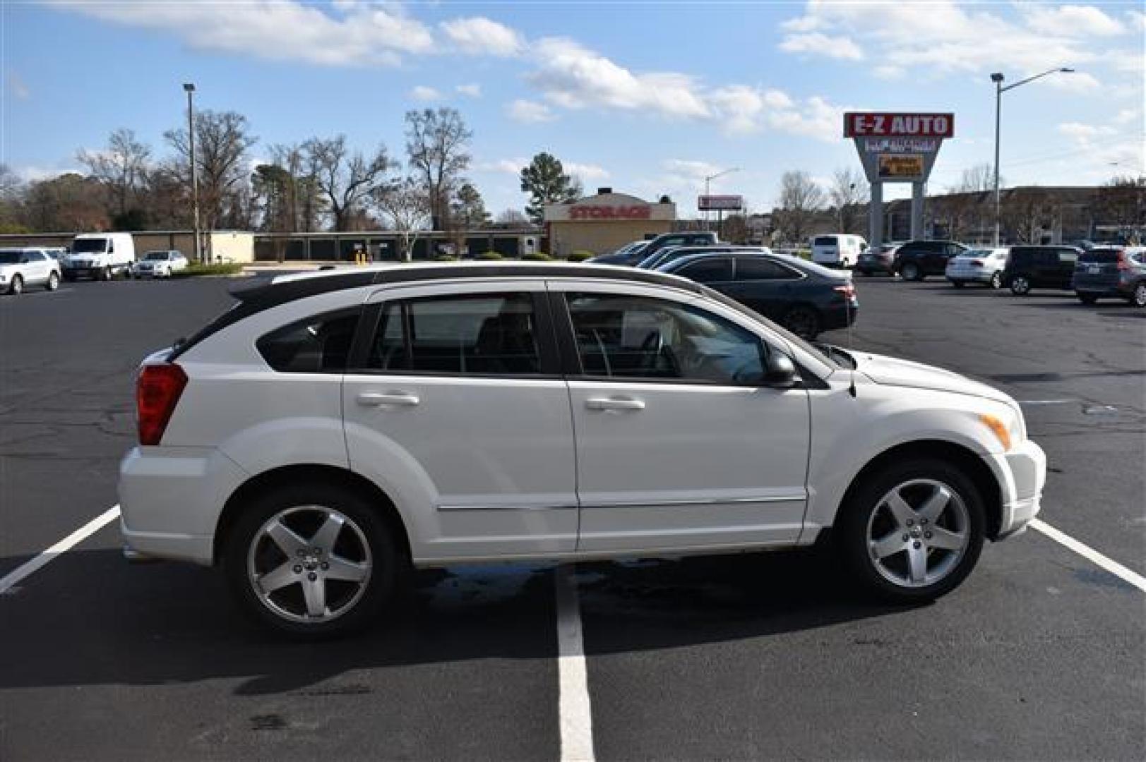 2009 Stone White Dodge Caliber R/T (1B3HB78B59D) , Continuously Variable Transmission transmission, located at 3900 Bragg Blvd., Fayetteville, NC, 28303, (910) 868-3000, 35.081905, -78.943367 - T-9750 - 2009 Dodge Caliber 1B3HB78B59D223993 - Photo#1