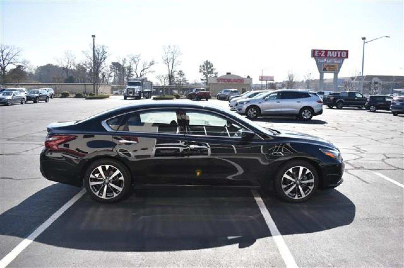 2017 Black Nissan Altima 2.5 SR (1N4AL3AP6HC) , Continuously Variable Transmission transmission, located at 3900 Bragg Blvd., Fayetteville, NC, 28303, (910) 868-3000, 35.081905, -78.943367 - T-9784 - 2017 Nissan Altima 1N4AL3AP6HC497967 - Photo#1