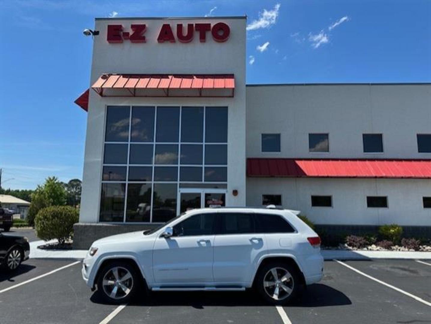 2014 Bright White Clearcoat Jeep Grand Cherokee Overland 4WD (1C4RJFCT9EC) , 5-Speed Automatic transmission, located at 3900 Bragg Blvd., Fayetteville, NC, 28303, (910) 868-3000, 35.081905, -78.943367 - T-9804 - 2014 Jeep Grand Cherokee 1C4RJFCT9EC105381 - Photo#0