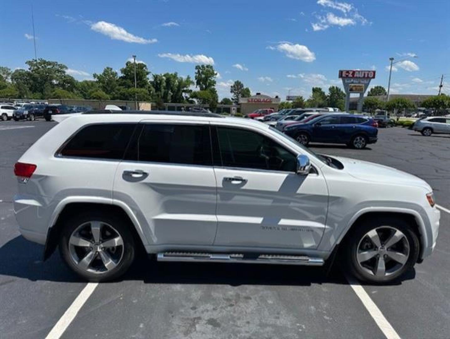 2014 Bright White Clearcoat Jeep Grand Cherokee Overland 4WD (1C4RJFCT9EC) , 5-Speed Automatic transmission, located at 3900 Bragg Blvd., Fayetteville, NC, 28303, (910) 868-3000, 35.081905, -78.943367 - T-9804 - 2014 Jeep Grand Cherokee 1C4RJFCT9EC105381 - Photo#2