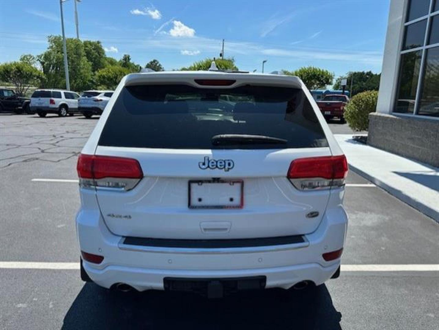 2014 Bright White Clearcoat Jeep Grand Cherokee Overland 4WD (1C4RJFCT9EC) , 5-Speed Automatic transmission, located at 3900 Bragg Blvd., Fayetteville, NC, 28303, (910) 868-3000, 35.081905, -78.943367 - T-9804 - 2014 Jeep Grand Cherokee 1C4RJFCT9EC105381 - Photo#3