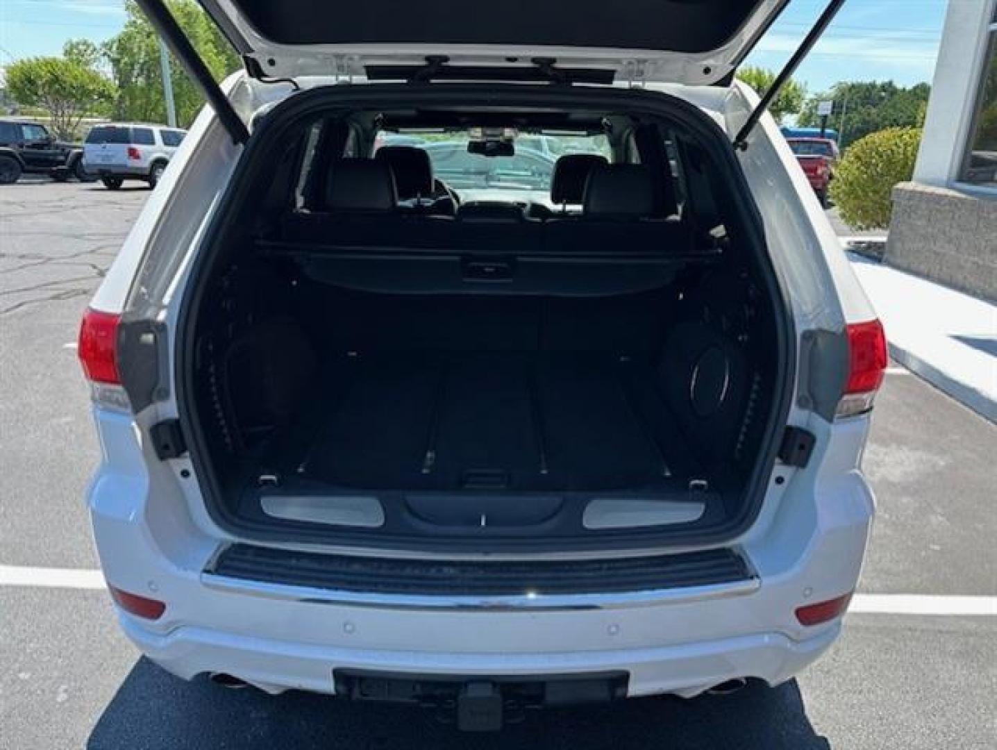 2014 Bright White Clearcoat Jeep Grand Cherokee Overland 4WD (1C4RJFCT9EC) , 5-Speed Automatic transmission, located at 3900 Bragg Blvd., Fayetteville, NC, 28303, (910) 868-3000, 35.081905, -78.943367 - T-9804 - 2014 Jeep Grand Cherokee 1C4RJFCT9EC105381 - Photo#4