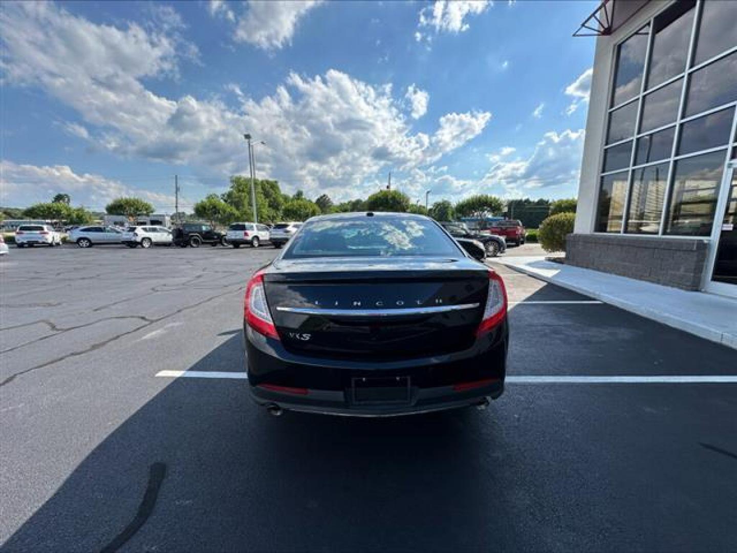 2016 Black Velvet Metallic Lincoln MKS FWD (1LNHL9DK7GG) , 6-Speed Automatic transmission, located at 3900 Bragg Blvd., Fayetteville, NC, 28303, (910) 868-3000, 35.081905, -78.943367 - T-9806 - 2016 Lincoln MKS 1LNHL9DK7GG603406 - Photo#3