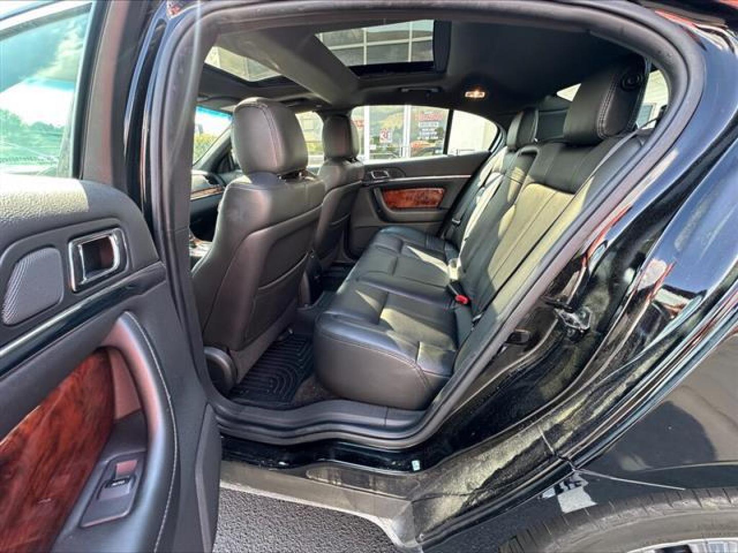 2016 Black Velvet Metallic Lincoln MKS FWD (1LNHL9DK7GG) , 6-Speed Automatic transmission, located at 3900 Bragg Blvd., Fayetteville, NC, 28303, (910) 868-3000, 35.081905, -78.943367 - T-9806 - 2016 Lincoln MKS 1LNHL9DK7GG603406 - Photo#7