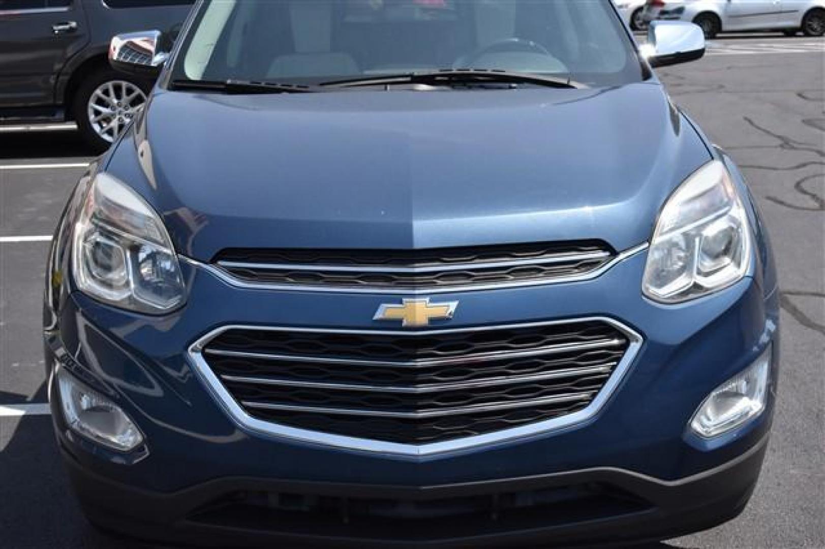 2017 Blue /Tan and Brown Chevrolet Equinox Premier 2WD (2GNALDEK9H6) , 6-Speed Automatic transmission, located at 3900 Bragg Blvd., Fayetteville, NC, 28303, (910) 868-3000, 35.081905, -78.943367 - T-9827 - 2017 Chevrolet Equinox 2GNALDEK9H6208840 - Photo#1