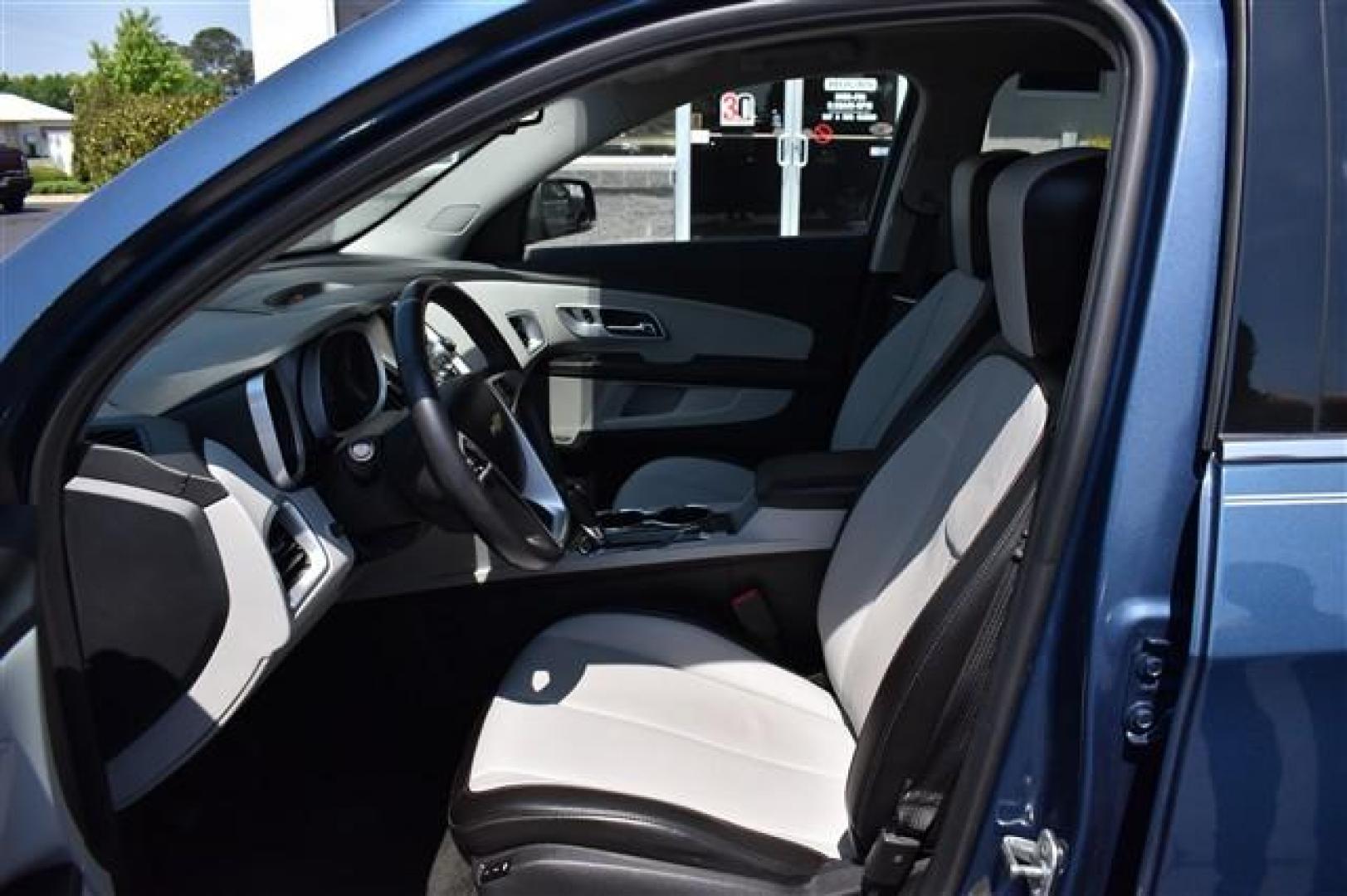 2017 Blue /Tan and Brown Chevrolet Equinox Premier 2WD (2GNALDEK9H6) , 6-Speed Automatic transmission, located at 3900 Bragg Blvd., Fayetteville, NC, 28303, (910) 868-3000, 35.081905, -78.943367 - T-9827 - 2017 Chevrolet Equinox 2GNALDEK9H6208840 - Photo#5