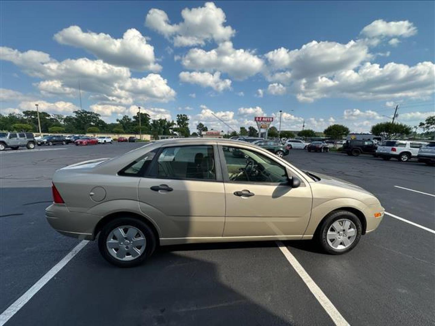 2007 Pueblo Gold Metallic Ford Focus ZX4 S (1FAFP34N67W) , 4-Speed Automatic transmission, located at 3900 Bragg Blvd., Fayetteville, NC, 28303, (910) 868-3000, 35.081905, -78.943367 - T-9830 - 2007 Ford Focus 1FAFP34N67W279173 - Photo#2