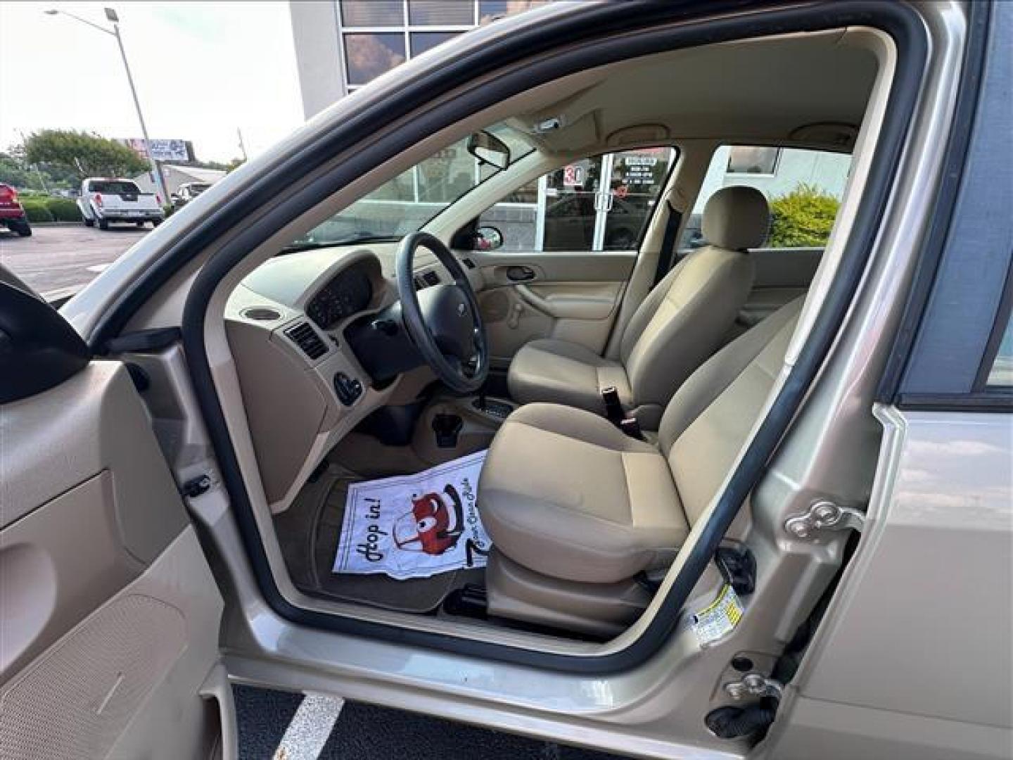 2007 Pueblo Gold Metallic Ford Focus ZX4 S (1FAFP34N67W) , 4-Speed Automatic transmission, located at 3900 Bragg Blvd., Fayetteville, NC, 28303, (910) 868-3000, 35.081905, -78.943367 - T-9830 - 2007 Ford Focus 1FAFP34N67W279173 - Photo#5