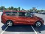 2018 Orange Chrysler Pacifica Touring Plus (2C4RC1FG6JR) , 9-Speed Automatic transmission, located at 3900 Bragg Blvd., Fayetteville, NC, 28303, (910) 868-3000, 35.081905, -78.943367 - Photo#2