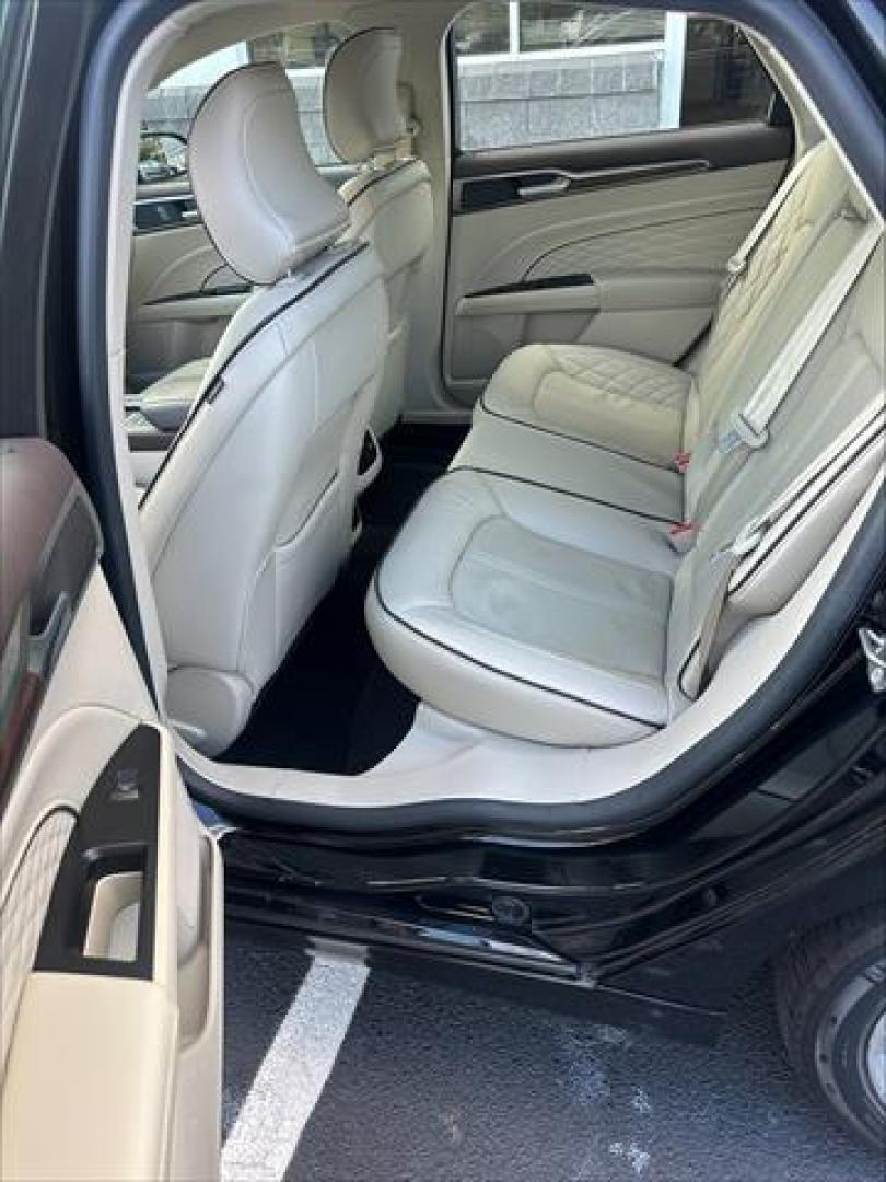 2017 Black Ford Fusion Energi Titanium (3FA6P0SU5HR) , Continuously Variable Transmission transmission, located at 3900 Bragg Blvd., Fayetteville, NC, 28303, (910) 868-3000, 35.081905, -78.943367 - T-9846 - 2017 Ford Fusion Energi 3FA6P0SU5HR328201 - Photo#7