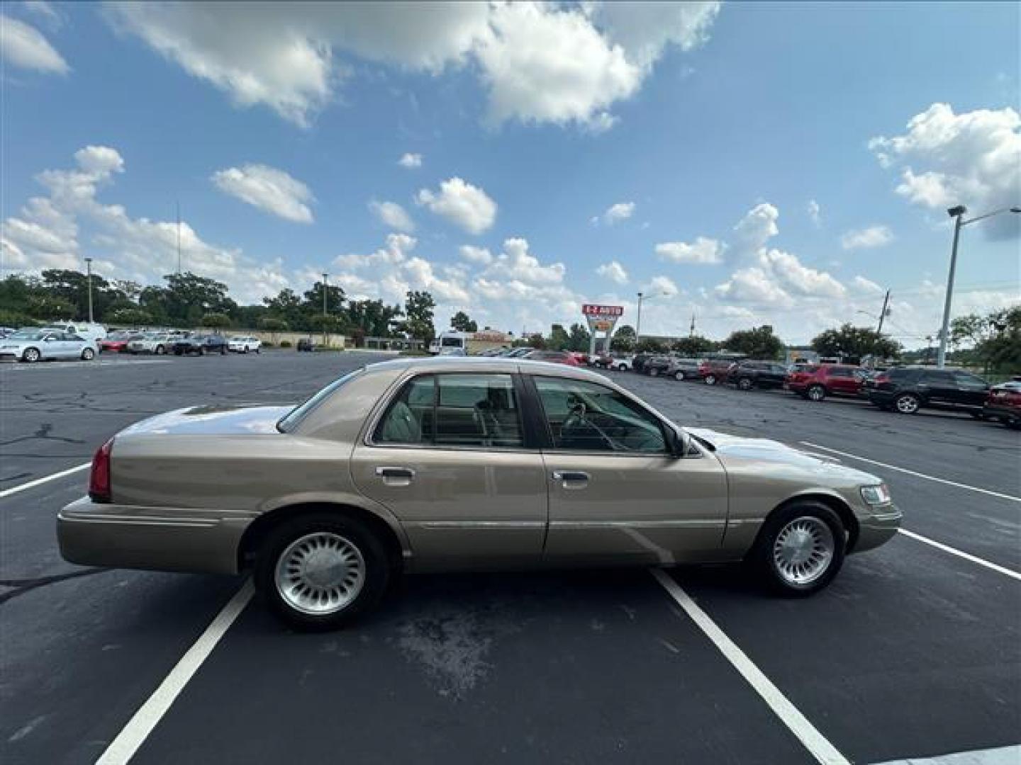 2002 Arizona Beige Metallic Mercury Grand Marquis LS Premium (2MEFM75W32X) , 4-Speed Automatic transmission, located at 3900 Bragg Blvd., Fayetteville, NC, 28303, (910) 868-3000, 35.081905, -78.943367 - T-9858 - 2002 Mercury Grand Marquis 2MEFM75W32X613432 - Photo#2