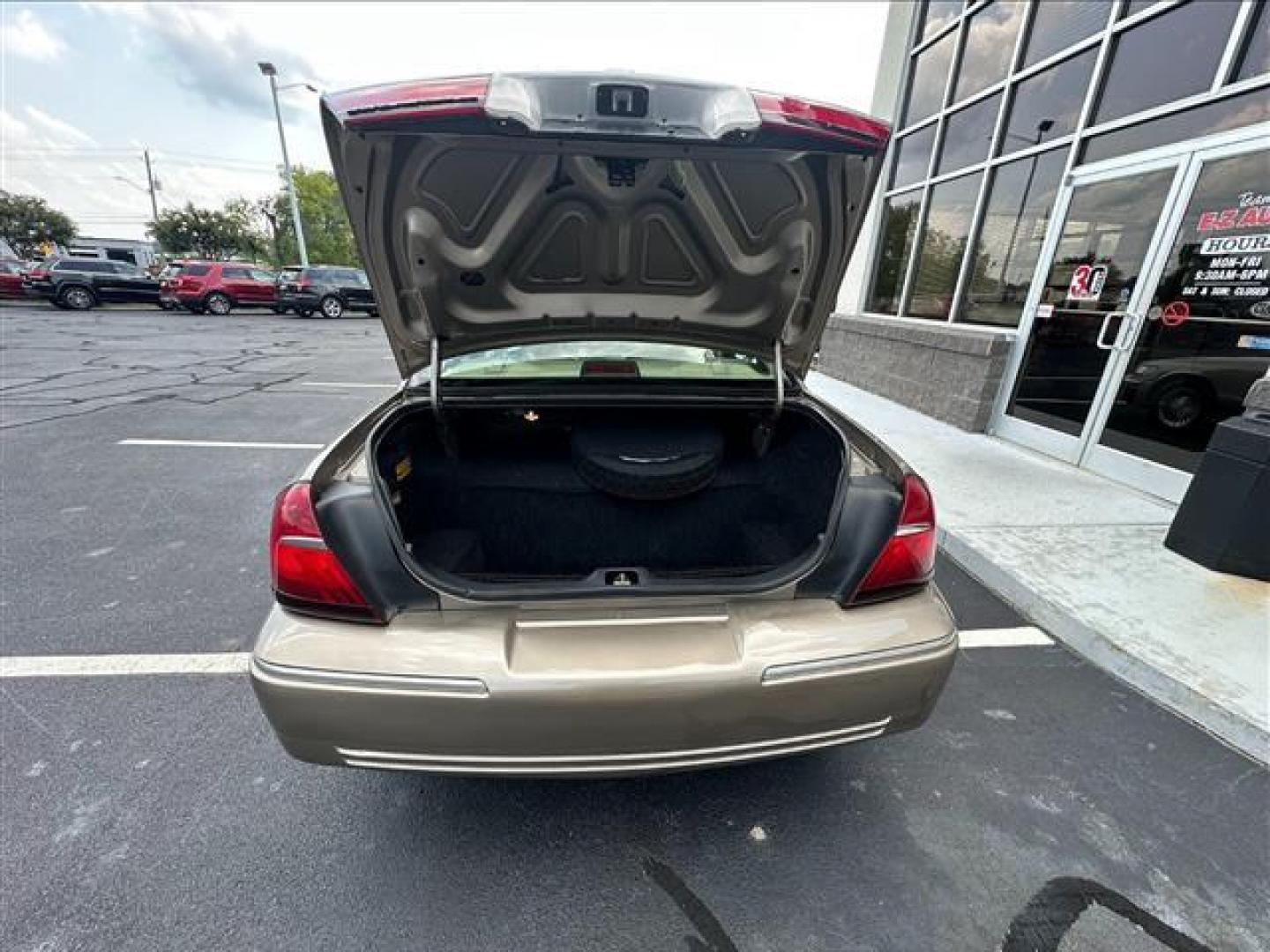 2002 Arizona Beige Metallic Mercury Grand Marquis LS Premium (2MEFM75W32X) , 4-Speed Automatic transmission, located at 3900 Bragg Blvd., Fayetteville, NC, 28303, (910) 868-3000, 35.081905, -78.943367 - T-9858 - 2002 Mercury Grand Marquis 2MEFM75W32X613432 - Photo#4