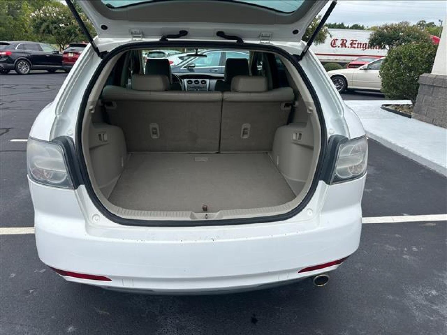 2011 Crystal White Pearl Mazda CX-7 i Touring (JM3ER2C53B0) , 6-Speed Automatic transmission, located at 3900 Bragg Blvd., Fayetteville, NC, 28303, (910) 868-3000, 35.081905, -78.943367 - T-9863 - 2011 Mazda CX-7 JM3ER2C53B0399978 - Photo#4