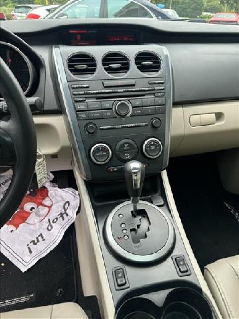 2011 Crystal White Pearl Mazda CX-7 i Touring (JM3ER2C53B0) , 6-Speed Automatic transmission, located at 3900 Bragg Blvd., Fayetteville, NC, 28303, (910) 868-3000, 35.081905, -78.943367 - T-9863 - 2011 Mazda CX-7 JM3ER2C53B0399978 - Photo#9