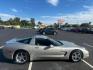 2004 Machine Silver Metallic Chevrolet Corvette Coupe (1G1YY22G345) , Automatic transmission, located at 3900 Bragg Blvd., Fayetteville, NC, 28303, (910) 868-3000, 35.081905, -78.943367 - C-2 - 2004 Chevrolet Corvette 1G1YY22G345128431 - Photo#2