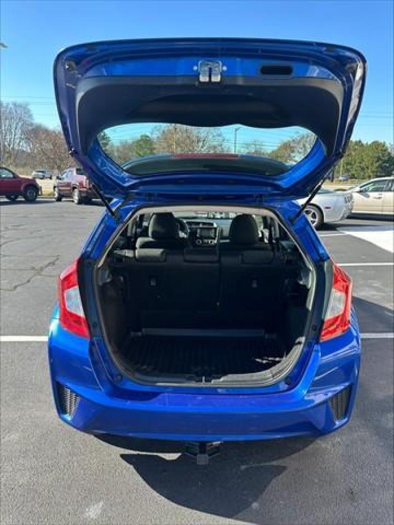 2015 Aegean Blue Metallic Honda Fit LX 6-Spd MT (3HGGK5G5XFM) , 6-Speed Manual transmission, located at 3900 Bragg Blvd., Fayetteville, NC, 28303, (910) 868-3000, 35.081905, -78.943367 - T-9939 - 2015 Honda Fit 3HGGK5G5XFM743845 - Photo#4