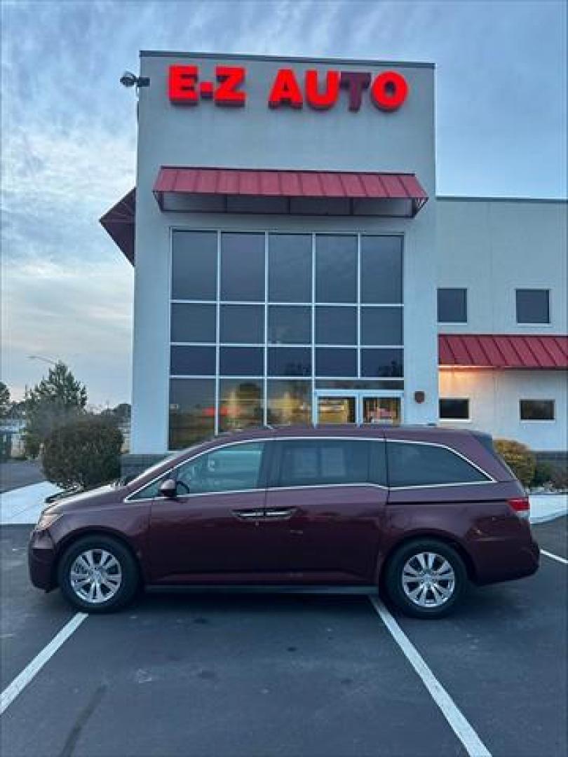 2016 Deep Scarlet Pearl Honda Odyssey EX-L (5FNRL5H67GB) , 6-Speed Automatic transmission, located at 3900 Bragg Blvd., Fayetteville, NC, 28303, (910) 868-3000, 35.081905, -78.943367 - T-9941 - 2016 Honda Odyssey 5FNRL5H67GB031939 - Photo#0