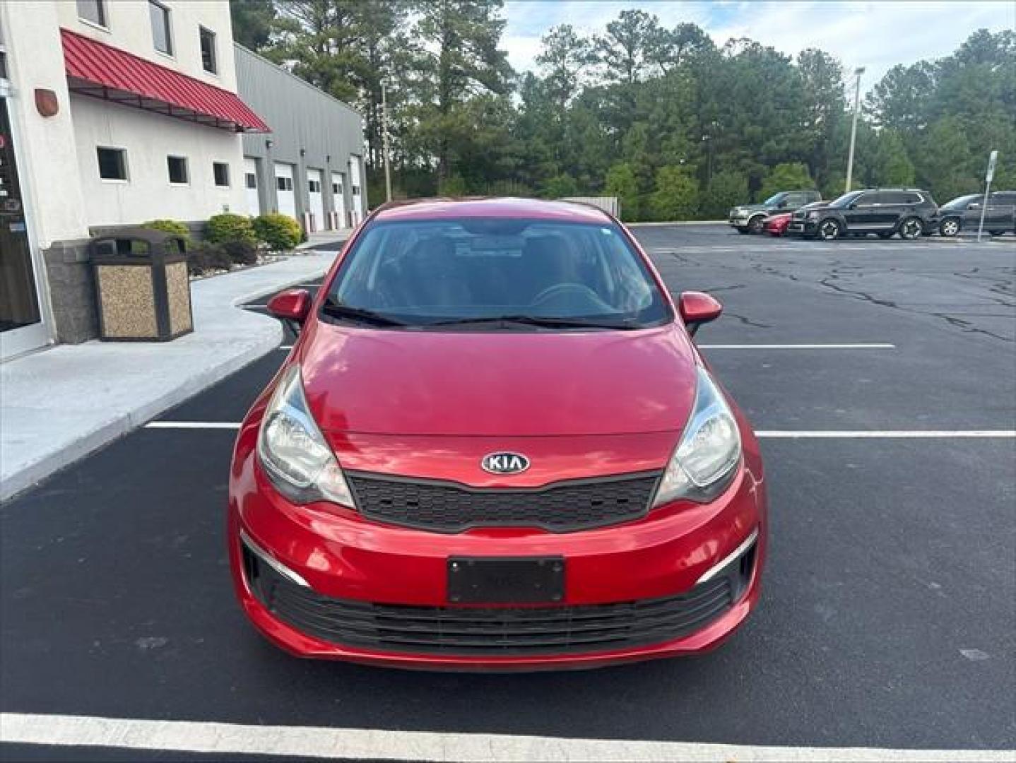 2017 Signal Red Kia Rio LX 6A (KNADM4A37H6) , 6-Speed Automatic transmission, located at 3900 Bragg Blvd., Fayetteville, NC, 28303, (910) 868-3000, 35.081905, -78.943367 - T-9993 - 2017 Kia Rio KNADM4A37H6015588- Photo#1