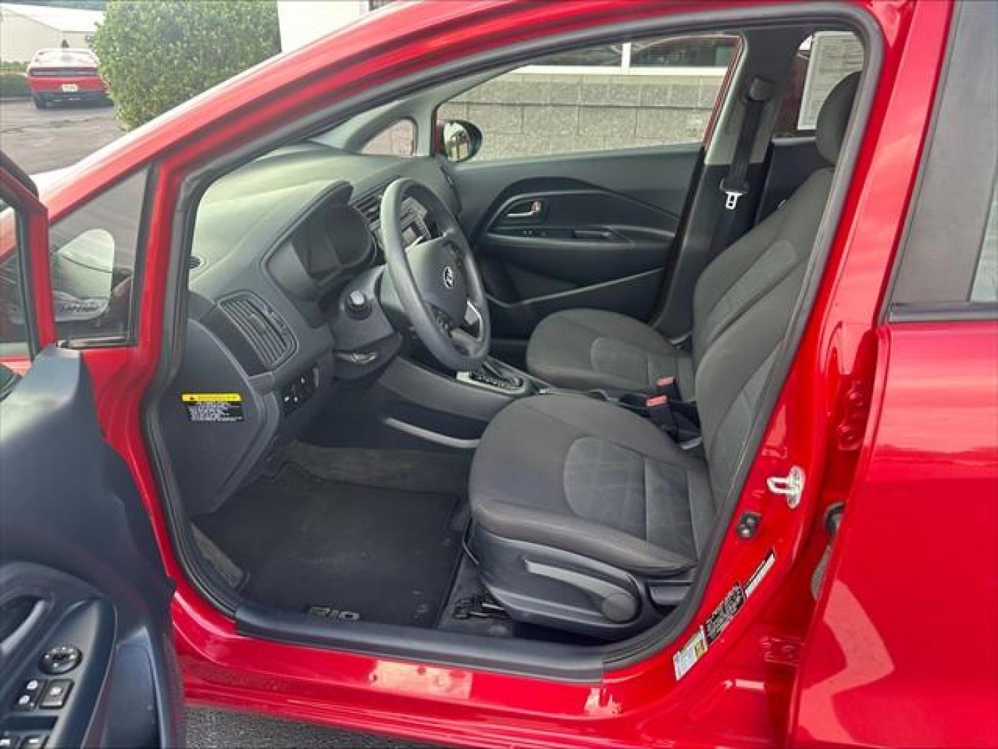 2017 Signal Red Kia Rio LX 6A (KNADM4A37H6) , 6-Speed Automatic transmission, located at 3900 Bragg Blvd., Fayetteville, NC, 28303, (910) 868-3000, 35.081905, -78.943367 - T-9993 - 2017 Kia Rio KNADM4A37H6015588- Photo#4