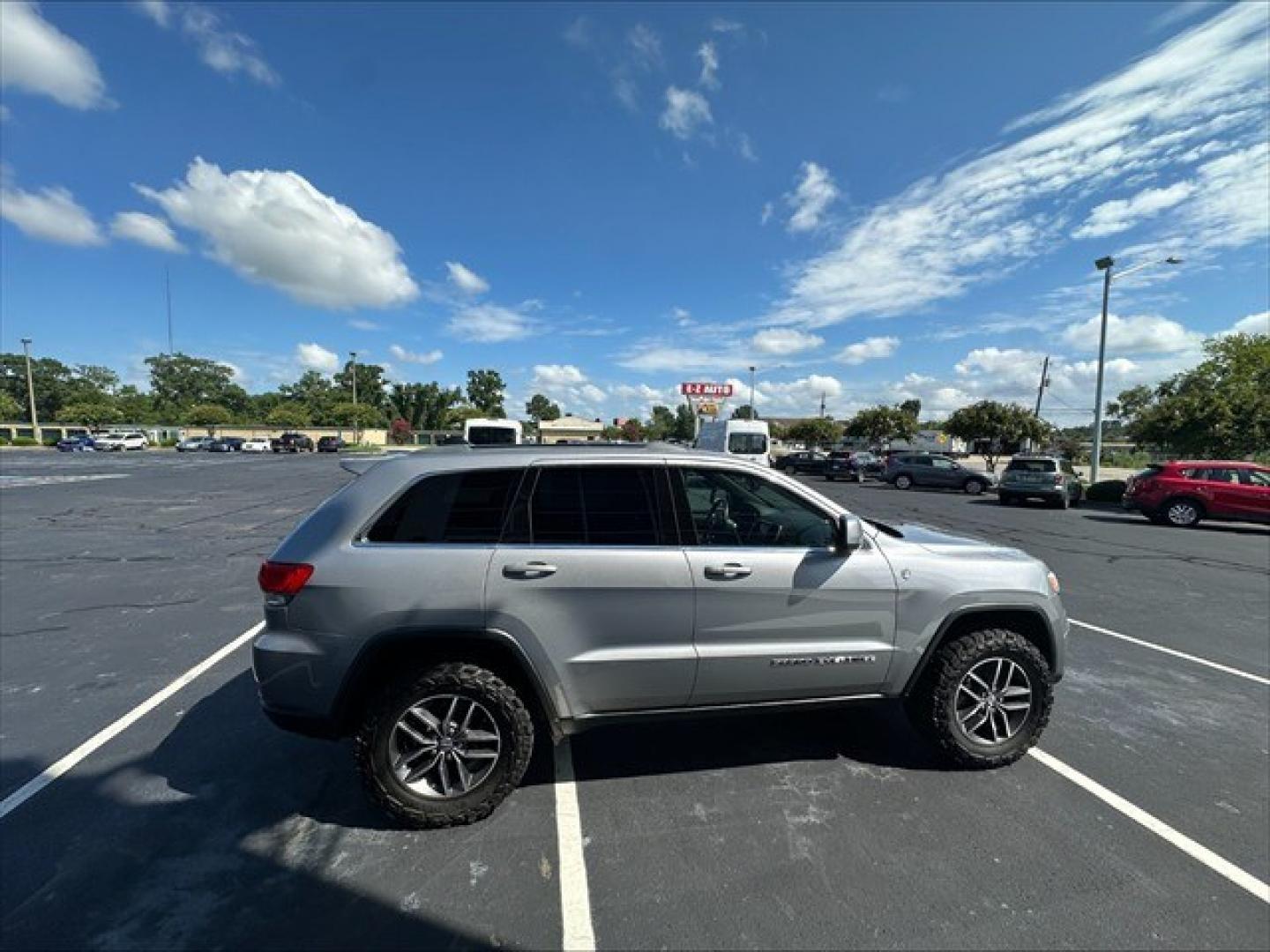 2018 Billet Silver Metallic Clear Coat Jeep Grand Cherokee Laredo 4WD (1C4RJFAG9JC) , 8-Speed Automatic transmission, located at 3900 Bragg Blvd., Fayetteville, NC, 28303, (910) 868-3000, 35.081905, -78.943367 - T-10005 - 2018 Jeep Grand Cherokee 1C4RJFAG9JC378854- Photo#2