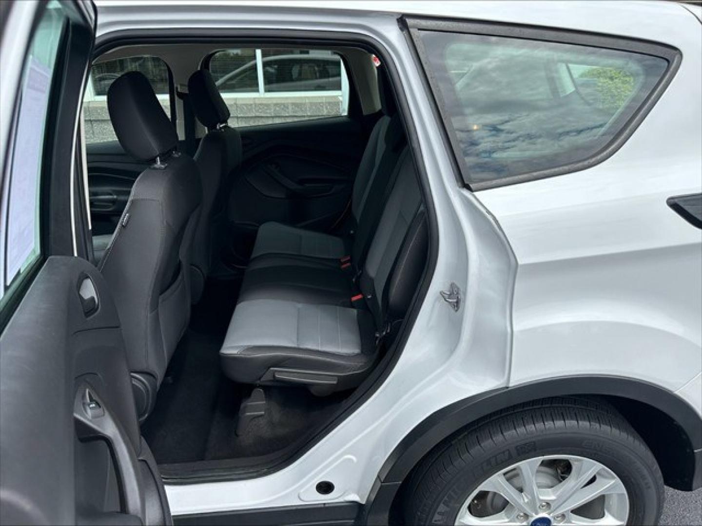 2018 Oxford White Ford Escape S FWD (1FMCU0F74JU) , 6-Speed Automatic transmission, located at 3900 Bragg Blvd., Fayetteville, NC, 28303, (910) 868-3000, 35.081905, -78.943367 - T-10009 - 2018 Ford Escape 1FMCU0F74JUB35073- Photo#6