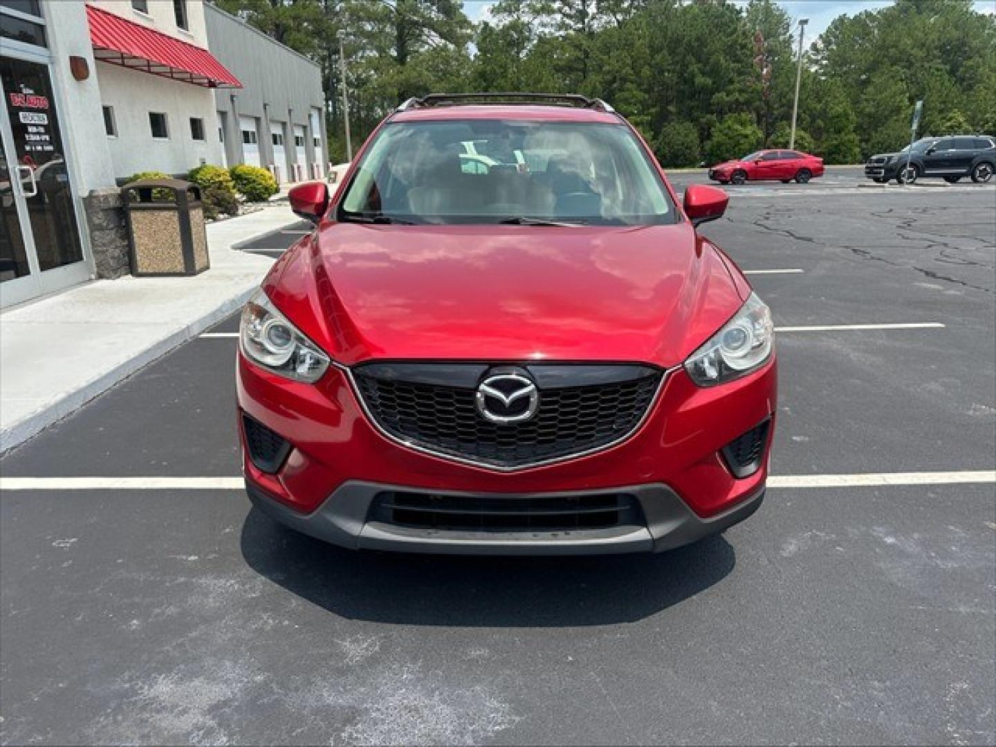 2015 Soul Red Mazda CX-5 Sport AT (JM3KE2BE0F0) , 6-Speed Automatic transmission, located at 3900 Bragg Blvd., Fayetteville, NC, 28303, (910) 868-3000, 35.081905, -78.943367 - T-10019 - 2015 Mazda CX-5 JM3KE2BE0F0457938- Photo#1