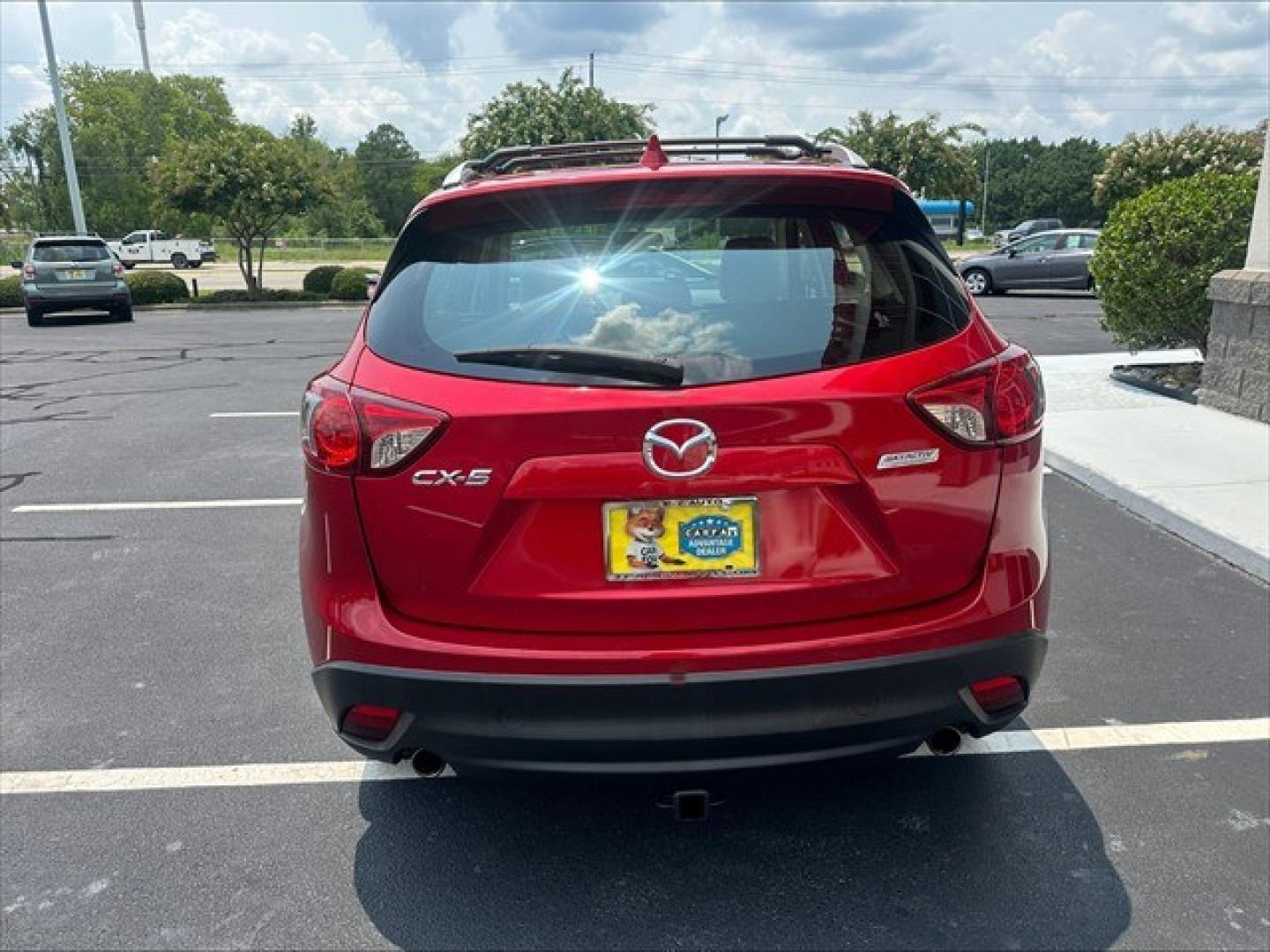 2015 Soul Red Mazda CX-5 Sport AT (JM3KE2BE0F0) , 6-Speed Automatic transmission, located at 3900 Bragg Blvd., Fayetteville, NC, 28303, (910) 868-3000, 35.081905, -78.943367 - T-10019 - 2015 Mazda CX-5 JM3KE2BE0F0457938- Photo#3
