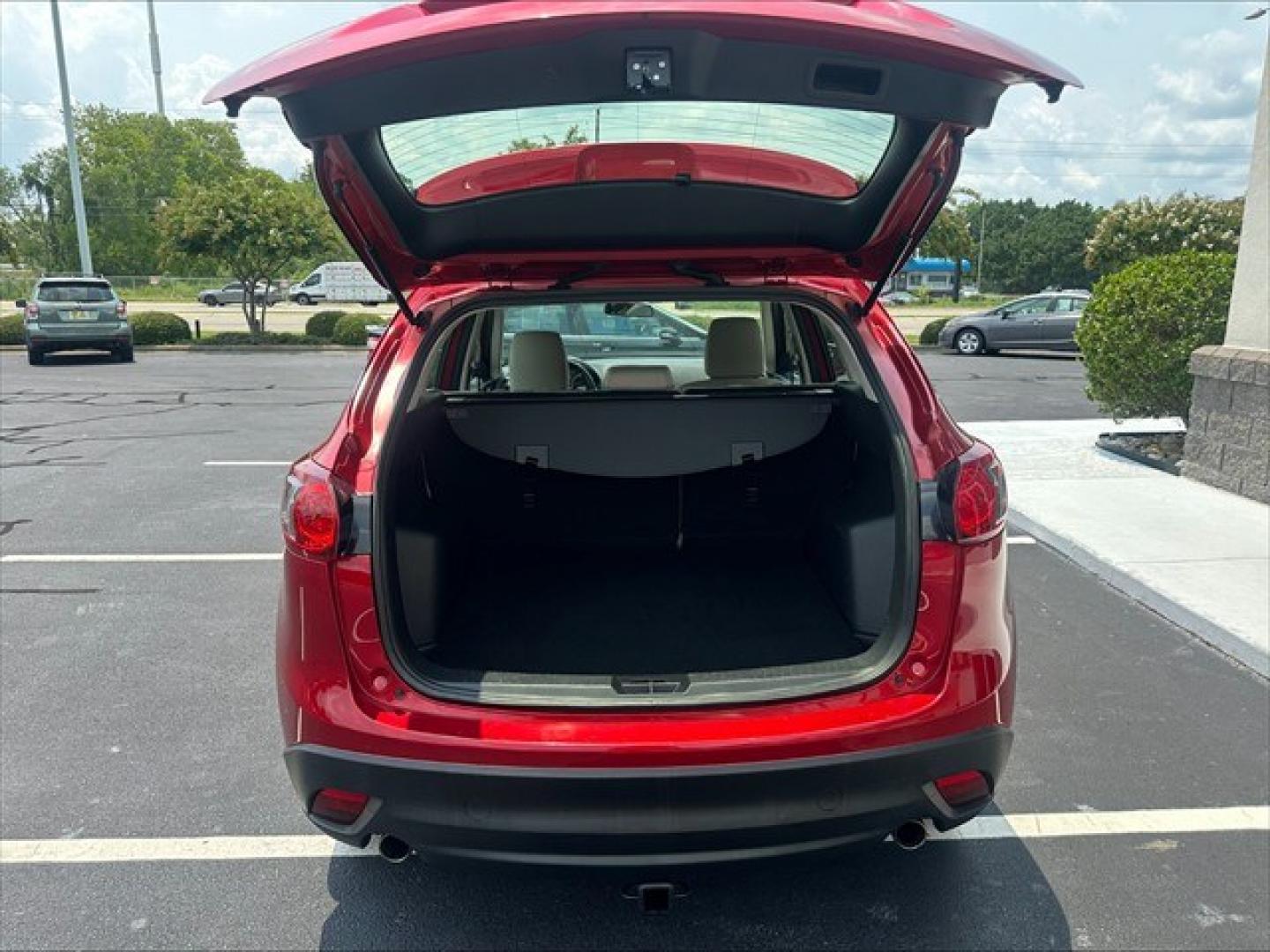 2015 Soul Red Mazda CX-5 Sport AT (JM3KE2BE0F0) , 6-Speed Automatic transmission, located at 3900 Bragg Blvd., Fayetteville, NC, 28303, (910) 868-3000, 35.081905, -78.943367 - T-10019 - 2015 Mazda CX-5 JM3KE2BE0F0457938- Photo#4