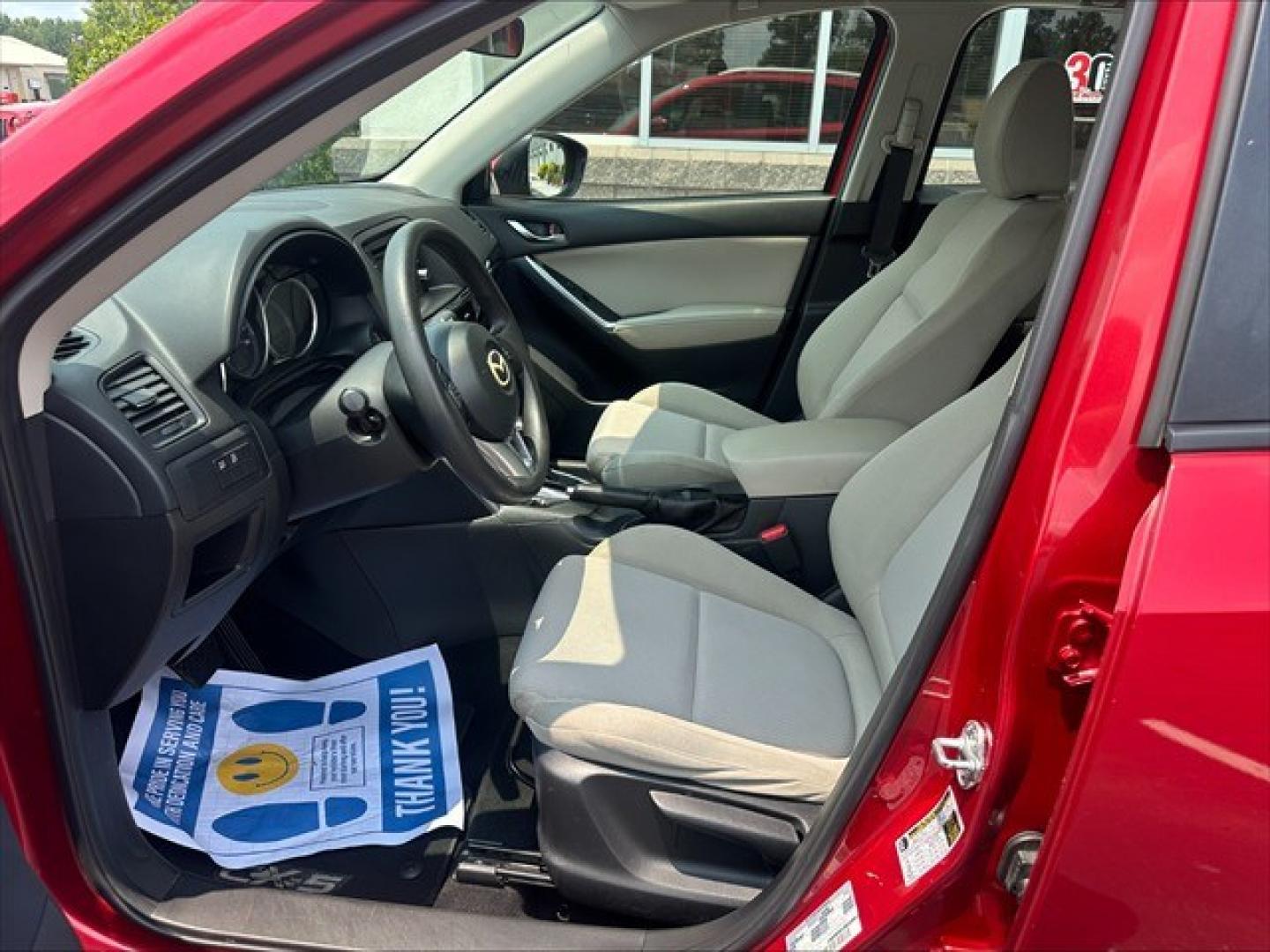 2015 Soul Red Mazda CX-5 Sport AT (JM3KE2BE0F0) , 6-Speed Automatic transmission, located at 3900 Bragg Blvd., Fayetteville, NC, 28303, (910) 868-3000, 35.081905, -78.943367 - T-10019 - 2015 Mazda CX-5 JM3KE2BE0F0457938- Photo#5
