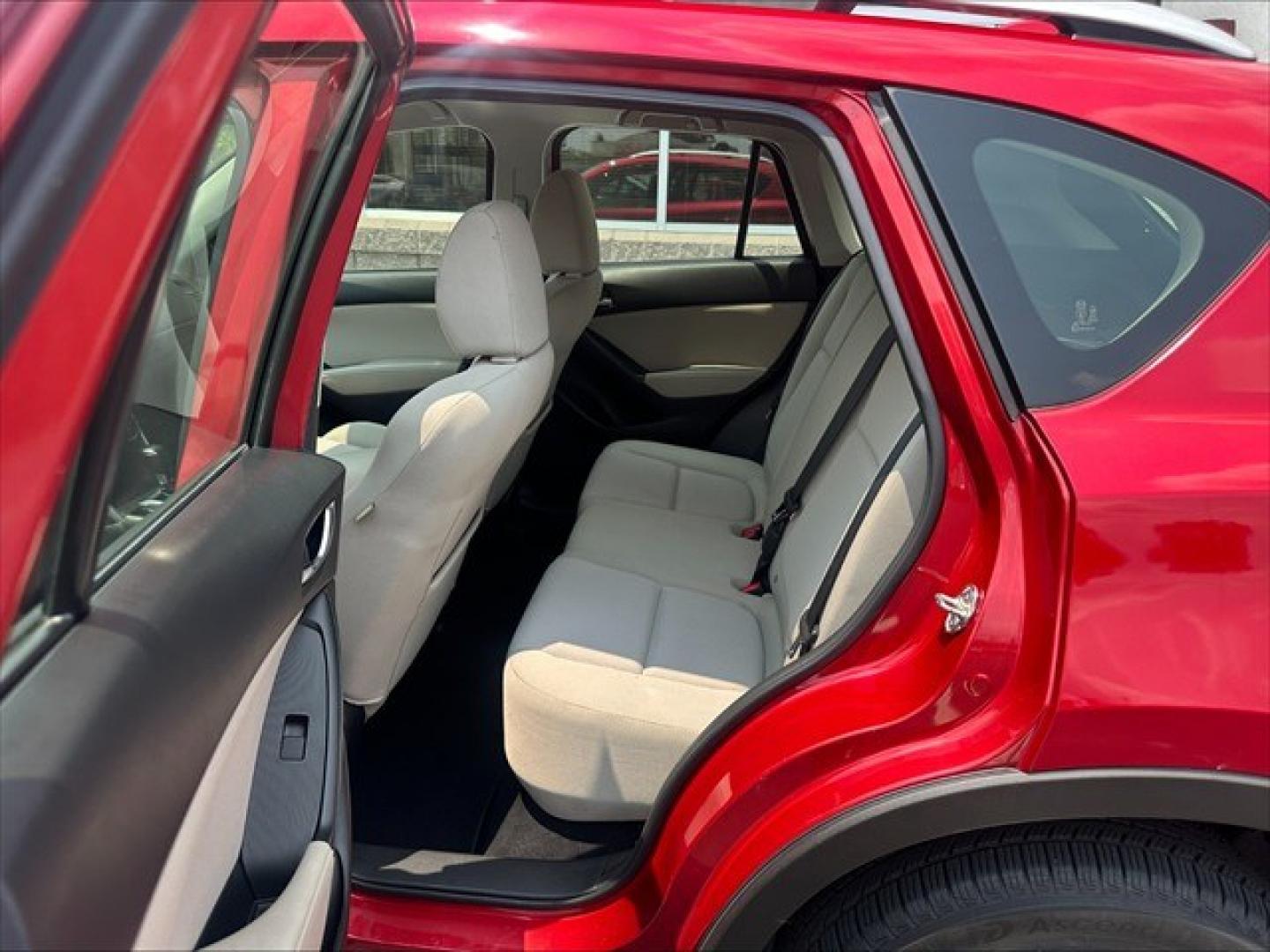2015 Soul Red Mazda CX-5 Sport AT (JM3KE2BE0F0) , 6-Speed Automatic transmission, located at 3900 Bragg Blvd., Fayetteville, NC, 28303, (910) 868-3000, 35.081905, -78.943367 - T-10019 - 2015 Mazda CX-5 JM3KE2BE0F0457938- Photo#6