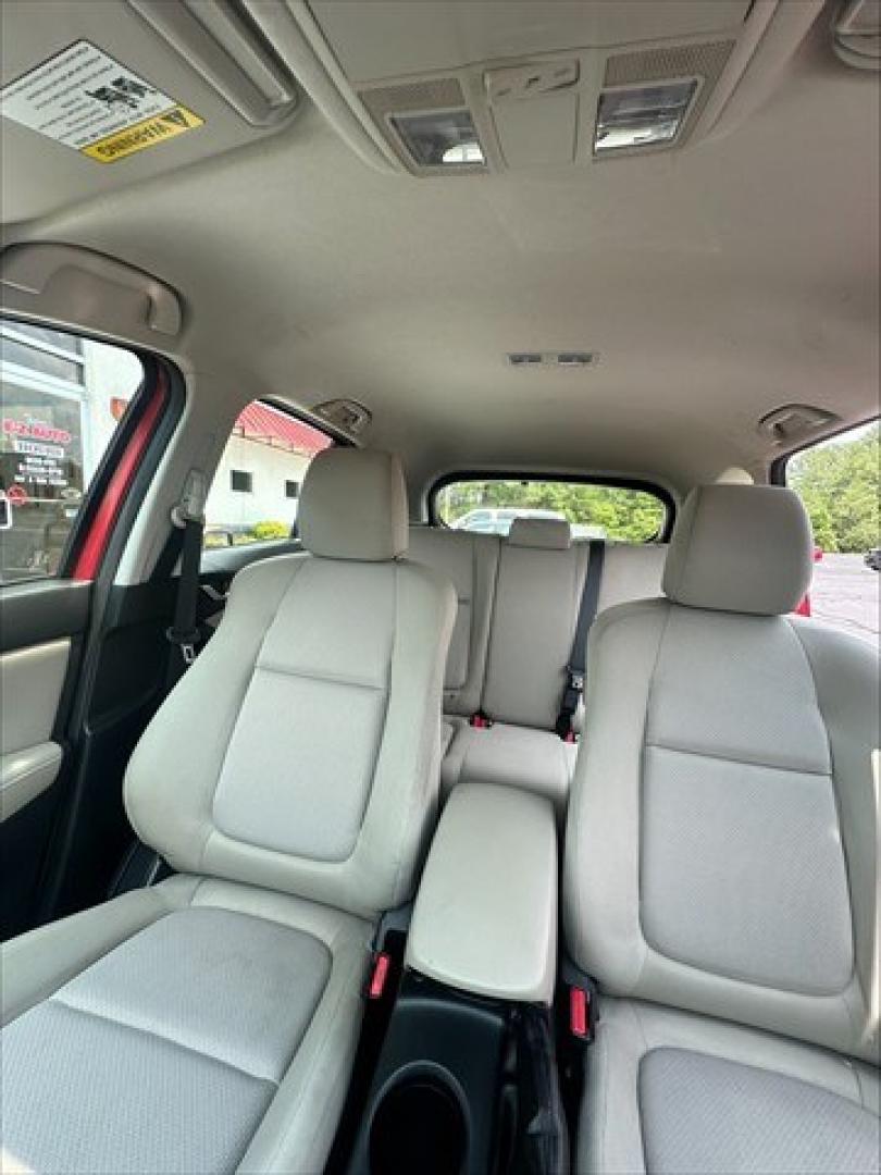 2015 Soul Red Mazda CX-5 Sport AT (JM3KE2BE0F0) , 6-Speed Automatic transmission, located at 3900 Bragg Blvd., Fayetteville, NC, 28303, (910) 868-3000, 35.081905, -78.943367 - T-10019 - 2015 Mazda CX-5 JM3KE2BE0F0457938- Photo#7